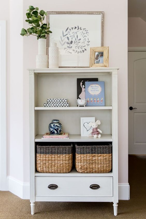 A-farmhouse-open-storage-unit-with-various-stuff-on-display-and-some-wicker-cubbies-for-smaller-stuff