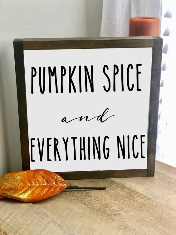 A-laconic-fall-sign-in-a-stained-frame-and-with-black-letters-for-outdoor-or-indoor-fall-decor