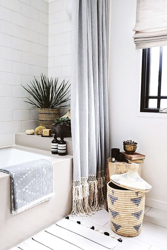 A-mid-century-modern-boho-bathroom-with-a-basket-with-a-lid-for-storage-so-cool-and-so-boho-like