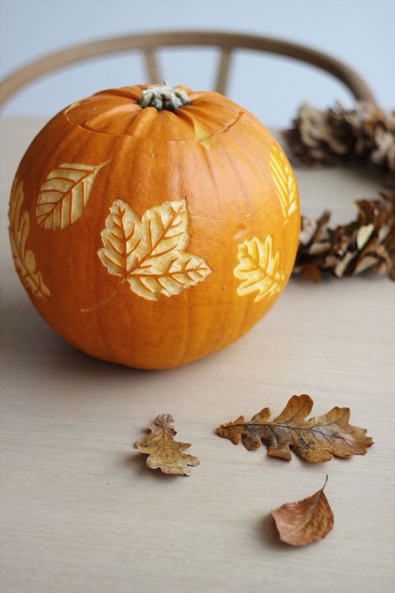 A-pumpkin-with-carved-leaves-is-a-beautiful-all-natural-fall-decoration-you-can-make-yourself