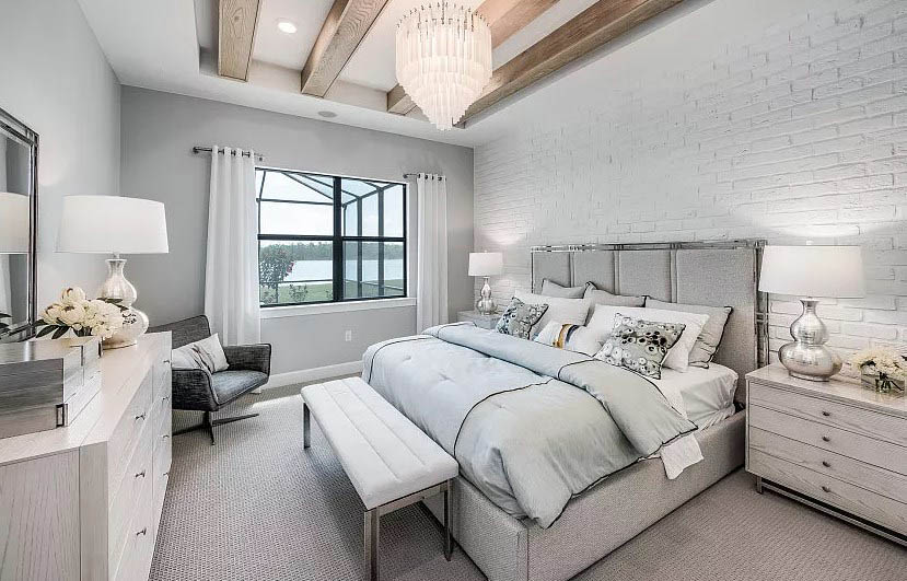 Bedroom-with-tray-ceiling-and-faux-wood-beams