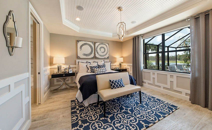 Master-bedroom-with-two-tone-wainscoting-and-honey-oak-flooring