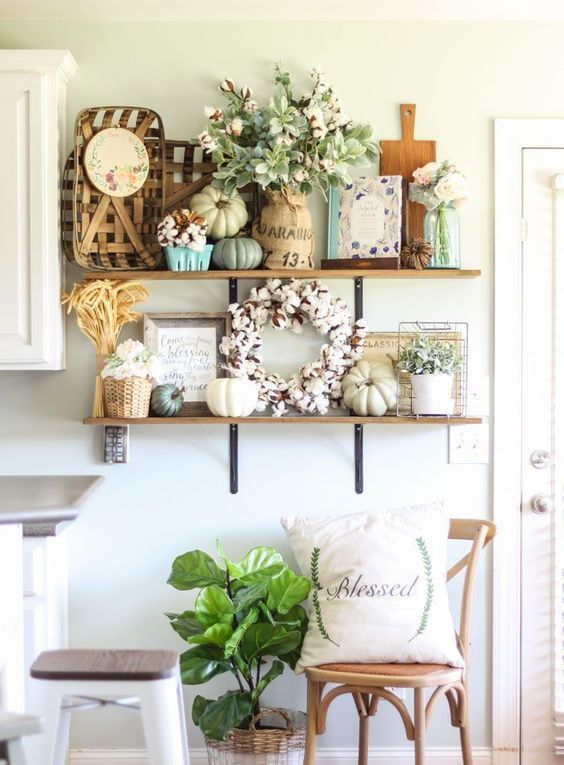 Neutral-fall-pumpkin-a-cotton-wreath-blooms-in-vases-potted-greenery-and-a-wheat-arrangement-for-a-fall-kitchen
