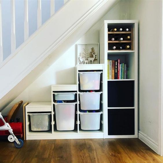 Place-an-ikea-kallax-shelving-unit-under-the-stairs-to-get-much-storage-space-without-any-effort