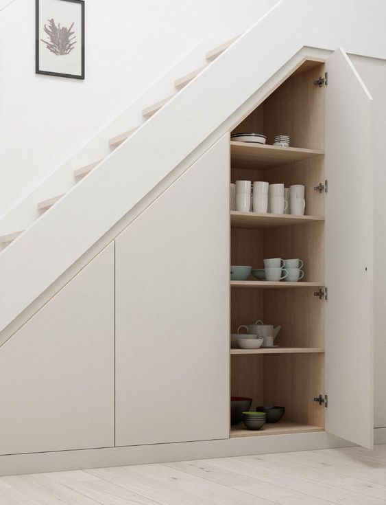 Sleek-hidden-storage-spaces-with-tableware-are-a-great-idea-if-you-dont-have-enough-space-in-the-kitchen