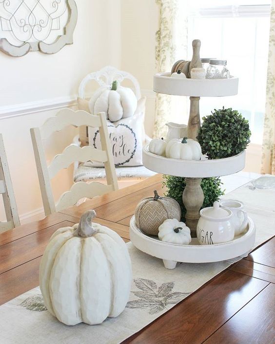 Some-fake-neutral-pumpkins-greenery-balls-and-a-printed-runner-will-bring-a-slight-fall-feel-to-the-space