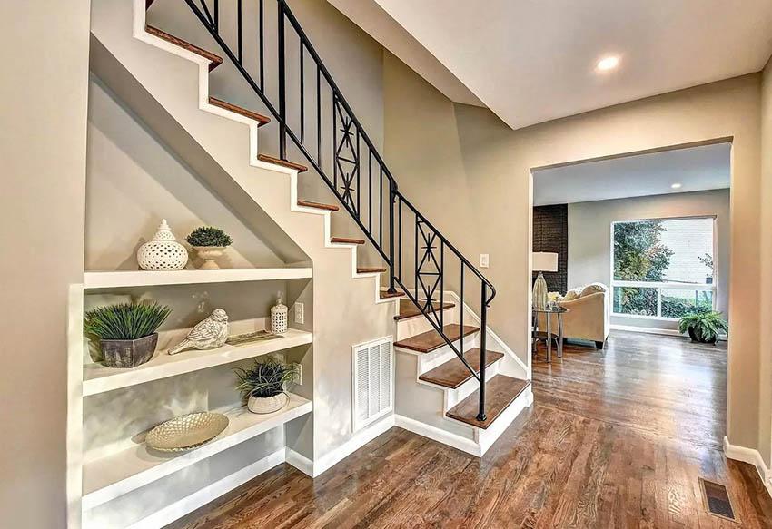 Under-stairs-niche-with-shelving-for-home-decor