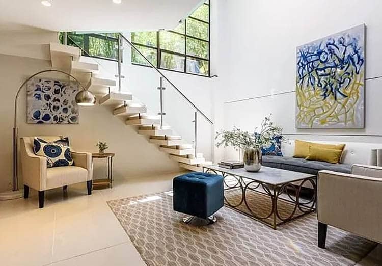 Under-stairs-seating-area-with-floor-lamp