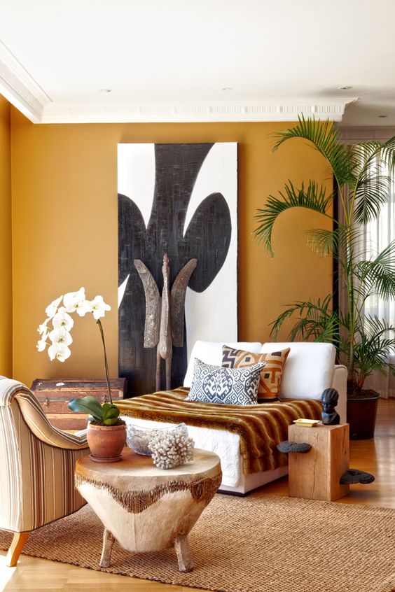 06-shades-of-ocher-carvings-of-wood-and-the-artworks-make-this-living-room-terrific
