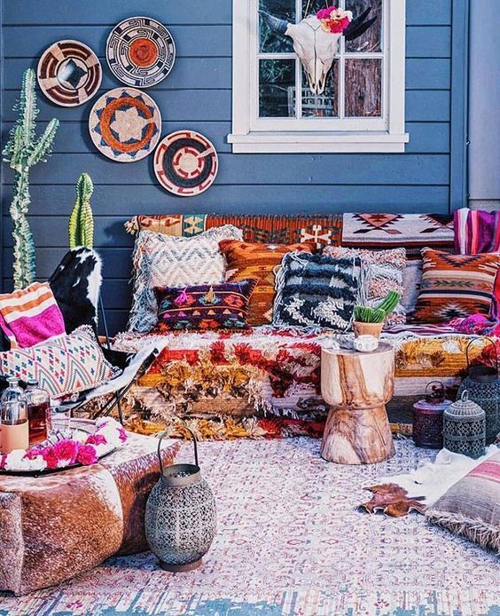 12-super-bright-printed-fringed-pillows-blankets-and-rugs-for-a-bold-boho-chic-space
