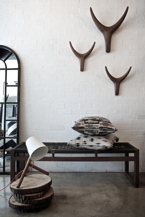 13-dark-wood-bench-with-a-woven-seat-and-ethnic-pillows