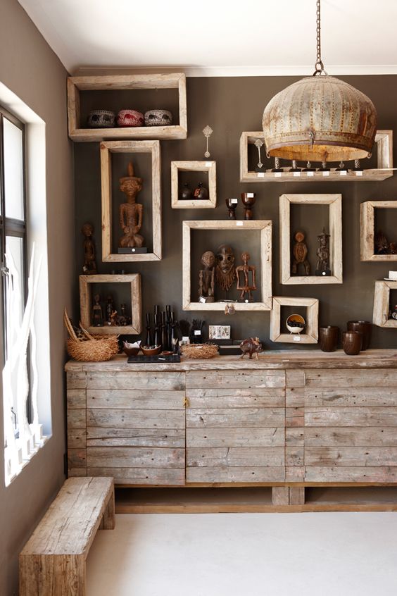 22-namibian-statuettes-and-pottery-on-framed-shelves