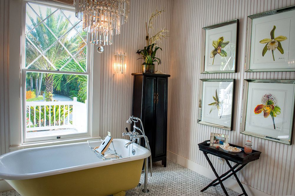Color-of-the-vintage-bathtub-complements-that-of-the-prints-in-the-framed-botanicals-79230