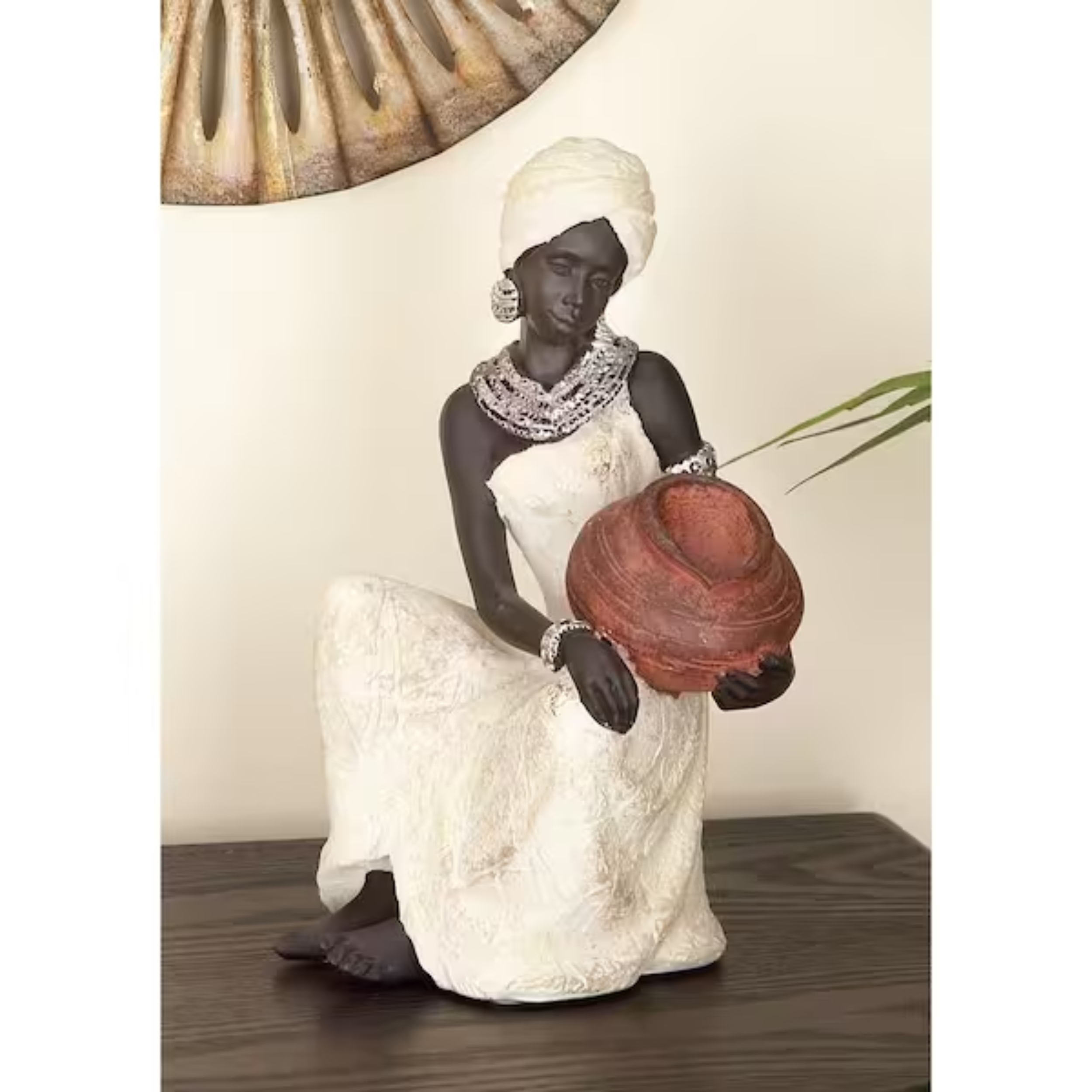 Cream polystone sitting african woman sculpture with red water pot