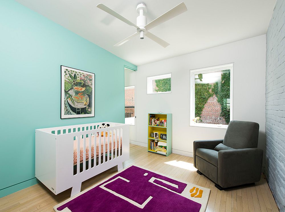 It-is-rug-in-bright-violet-that-anchors-this-scandinavian-nursery