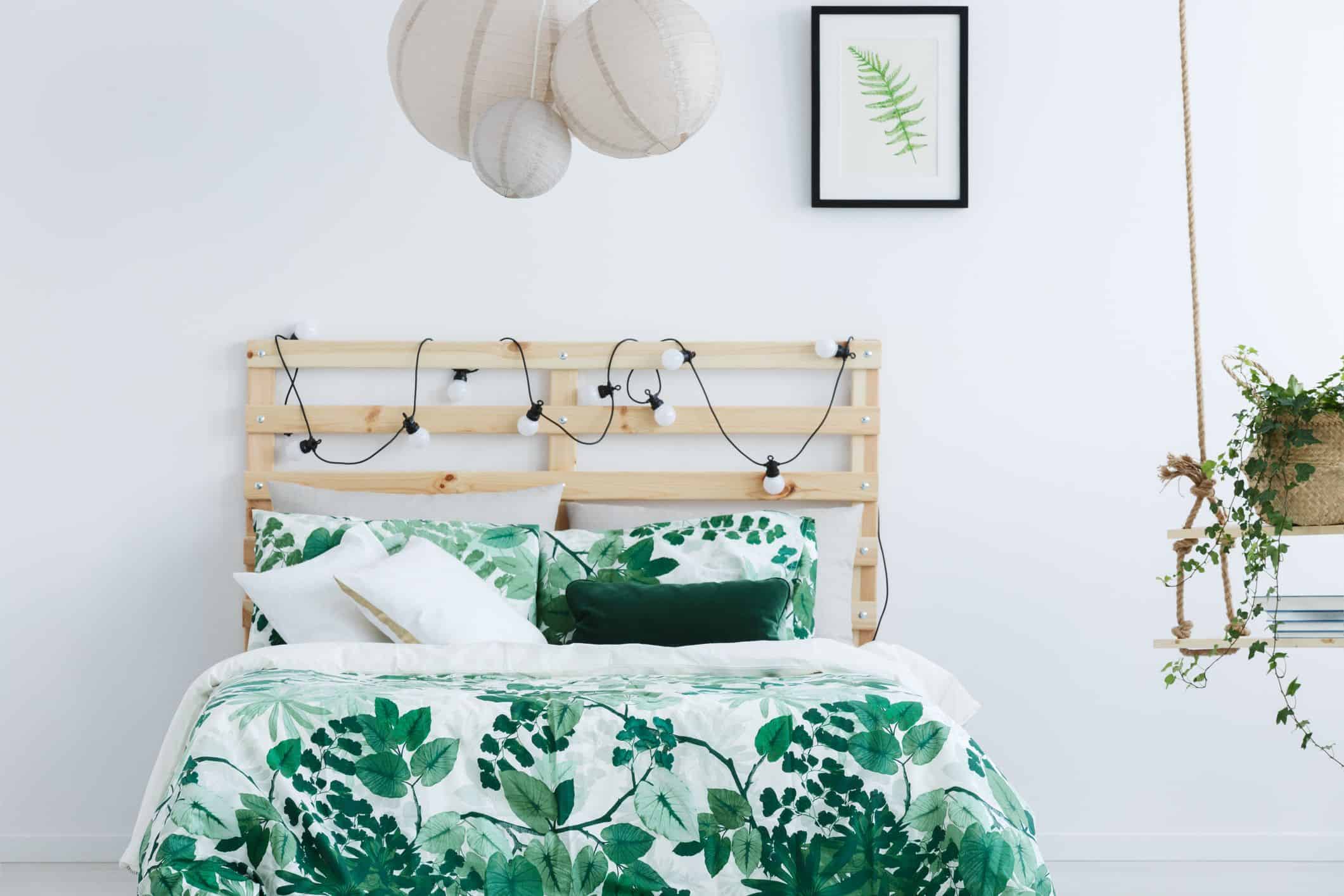 White-bedroom-with-wooden-bed-royalty-free-image-691782182-1547780421