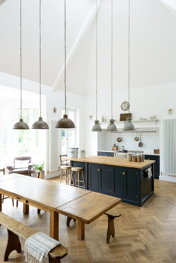 07-rustic-and-industrial-kitchen-decor-with-lot-of-warm-woods-and-pendant-lamps-that-unite-the-space