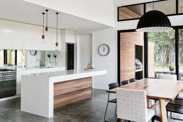 16-sleek-white-minimalist-kitchen-and-a-modern-diner-connected-with-colors-and-pendant-lamps
