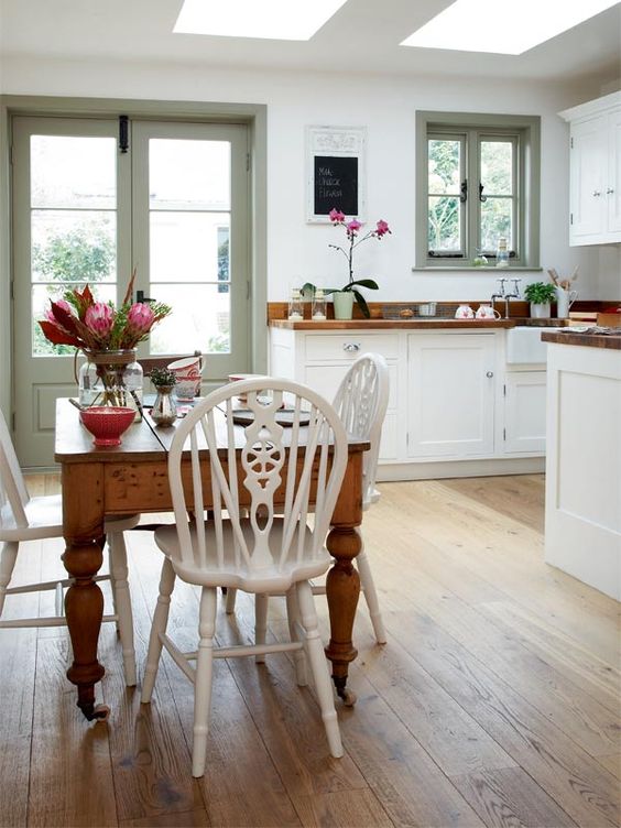 18-rustic-kitchen-and-diner-with-a-vintage-dining-table-and-chairs