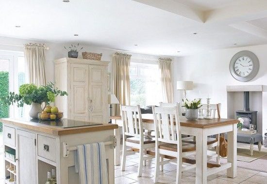 19-serene-white-kitchen-with-off-white-furniture-and-a-comfy-diner-by-the-hearth