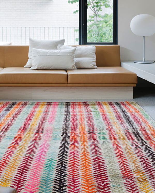 Colorful-rug-loom-old-yarn-wheat