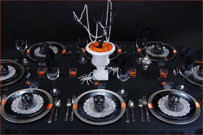Ghoulish-glam-halloween-table-setting-with-black-skulls