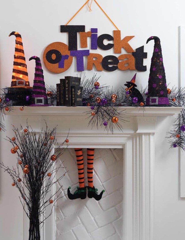 Glitterly-orange-and-purple-halloween-mantel-decor-with-witch-legs-768x997-1