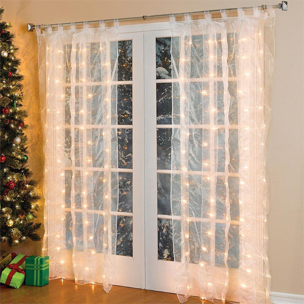 String-lights-illuminating-the-transparent-curtains-