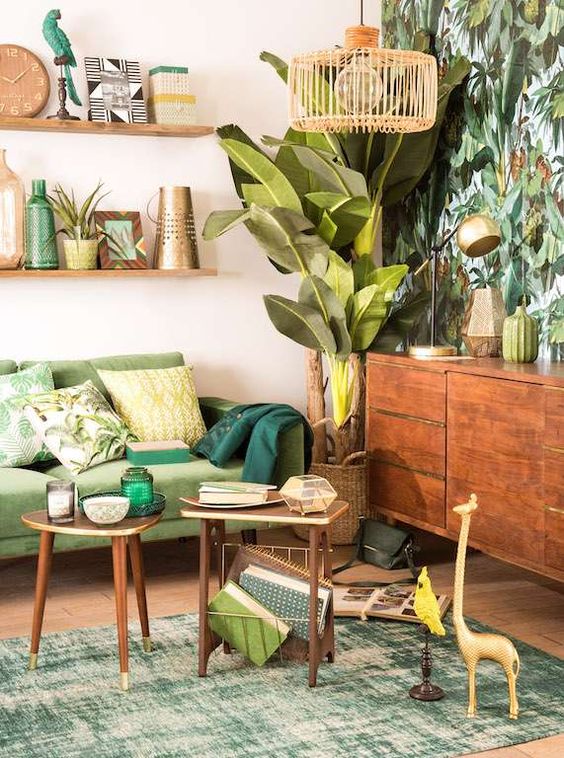 A-colorful-tropical-living-room-with-a-tropical-leaf-wall-a-green-sofa-wooden-furniture-woven-and-rattan-elements