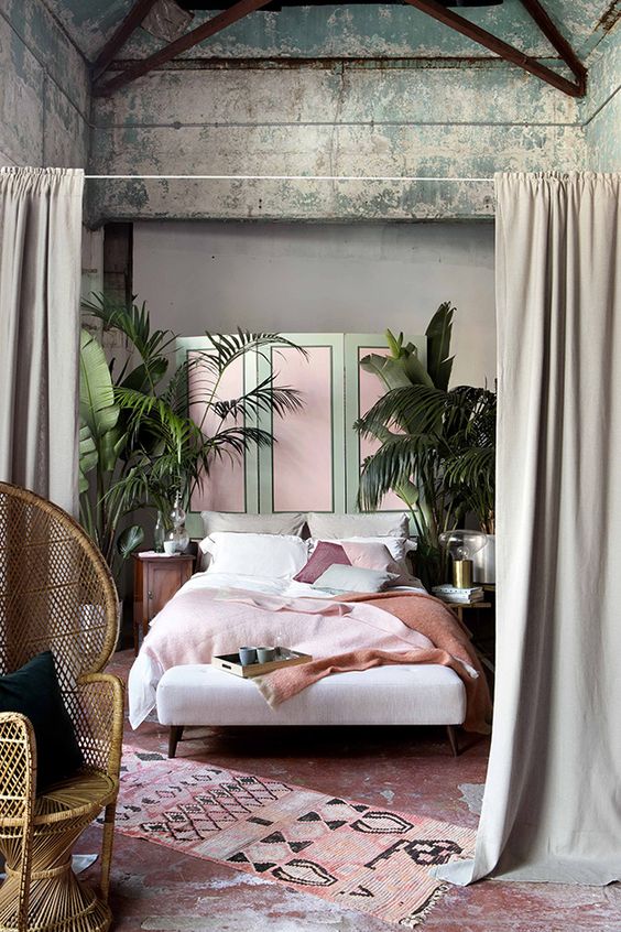 A-unique-tropical-bedroom-with-a-shabby-chic-ceiling-a-bed-and-a-bench-wooden-nightstands-and-a-peacock-chair-plus-tropical-plants