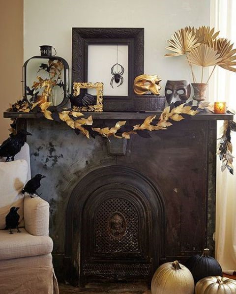 An-exquisite-mantel-with-a-black-and-gold-leaf-garland-gilded-fronds-frames-masks-and-blackbirds-all-around