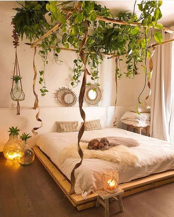 Climbing-plants-covering-the-canopy-of-the-bed-make-the-bedroom-look-boho-and-remind-an-oasis