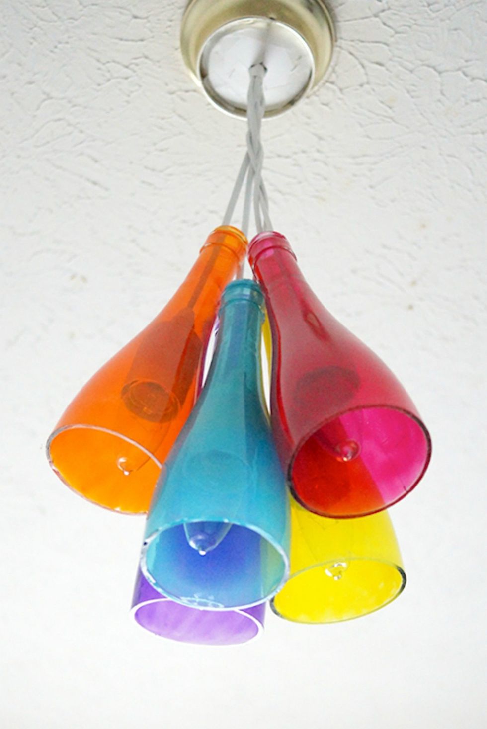 Gallery-1511368674-make-a-diy-chandelier-using-wine-bottles-and-mod-podge-sheer-colors