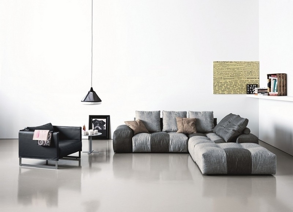 Gray-sofa-designs-leather-armchair-white-wall-color