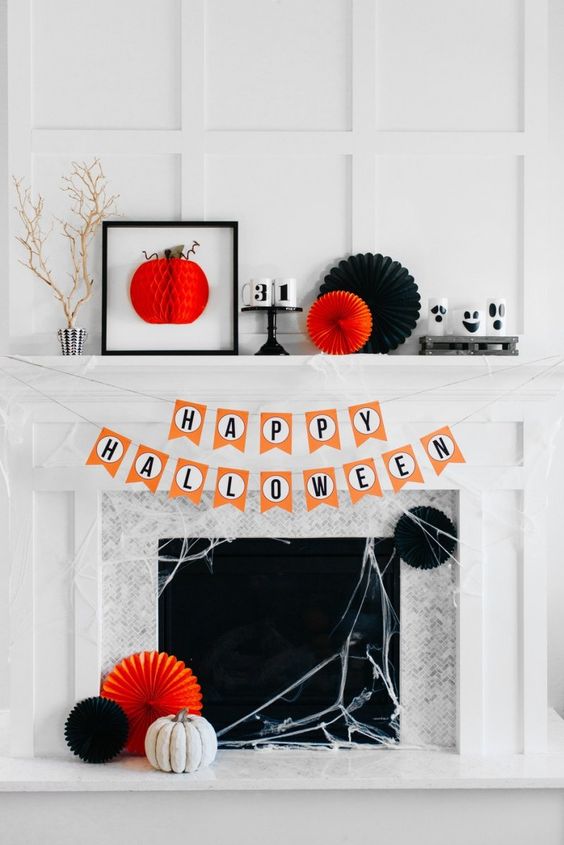 Last-minute-halloween-mantel-with-paper-fans-a-3d-artwork-numbers-branches-and-spiderwebs