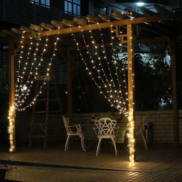 Outdoor-diy-curtain-string-lights-for-christmas-pergolas