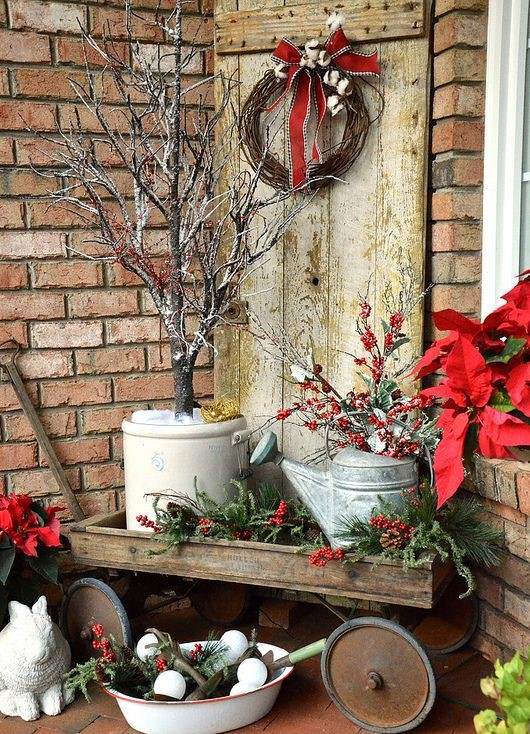 32-vintage-cart-with-watering-cans-pots-and-evergreens
