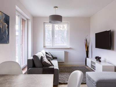 Living room with table, couch and television