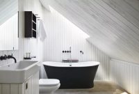Bathroom and black bateau-style garden tub