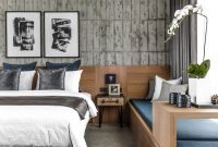 Blue bedroom in concrete themed home interior