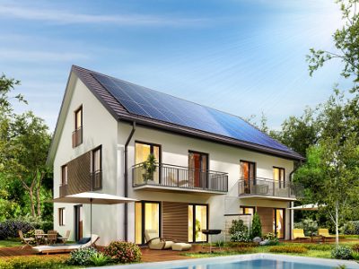 Townhouse with solar panels on the roof and a terrace and swimming pool