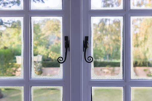 Condensation on double glazed wooden windows due to cold bridging, uk