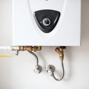Modern gas water heater with water temperature control knob