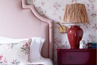 Bedroom with red prints and plains