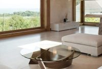 Coffee table with wooden sculptural leg