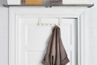 Shelf added over the door in the bathroom