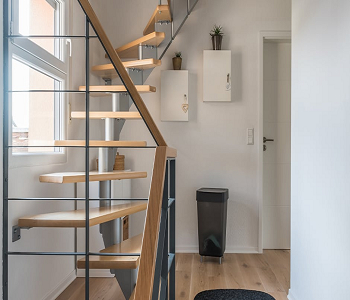 Small storage cabinets for functional staircase wall decor Extra Ordinary Staircase Wall Decorating Ideas As Focal Point