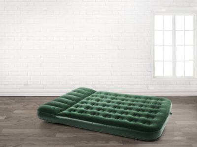 Inflatable mattress in an empty room