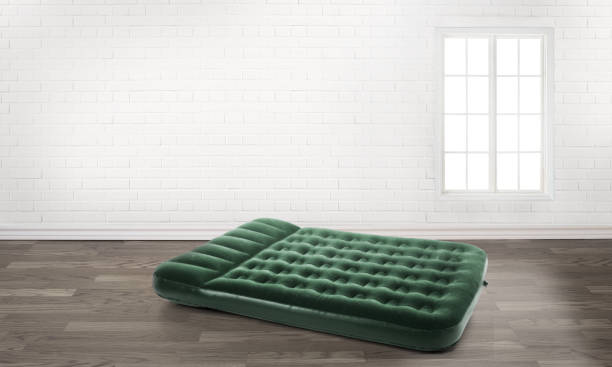 Inflatable mattress in an empty room