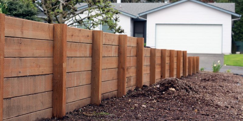 Horizontal sturdy retaining wall in yard for erosion and separat